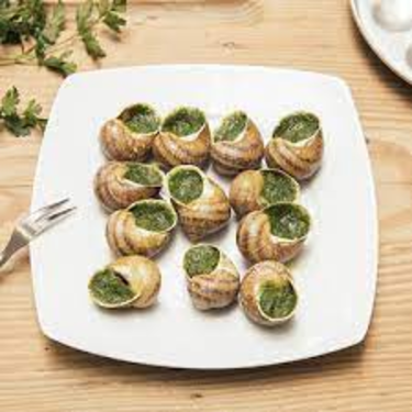 18 Local Snails Stuffed with Garlic, Herb de Provence and Spices